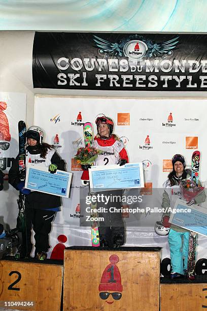 Sarah Burke of Canada takes 1st place, Devin Logan of USA takes 2nd place, Virginie Faivre of Switzerland takes 3rd place during the FIS Freestyle...