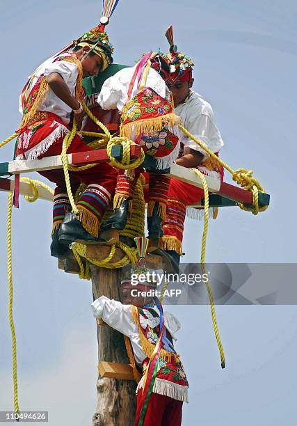 Mexican Totonaca indigenous boys perform the ritual dance of Los Voladores at a school for "Voladores" in Papantla, in the state of Veracruz, on...