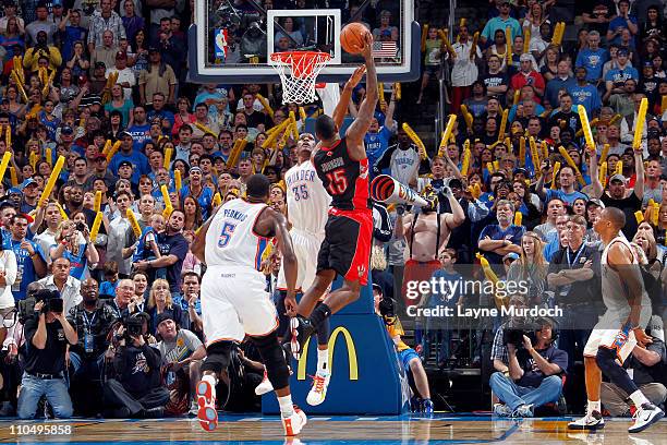 Amir Johnson of the Toronto Raptors shoots the game winning shot against the Oklahoma City Thunder during the game on March 20, 2011 at the Oklahoma...