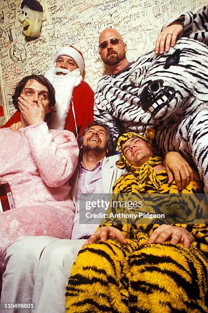 Portrait of The Flaming Lips backstage at the Warfield Theater, San Francisco, California, USA on 28th May 2003, Wayne Coyne , Michael Ivins , Steven...