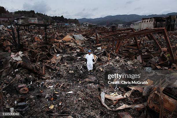 Sigo Hatareyama works to clean out what is left of his house on March 21, 2011 in Kesennuma, Japan. The 9.0 magnitude strong earthquake struck...