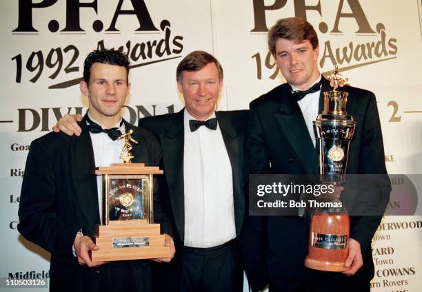 Manchester United Manager Alex Ferguson congratulates his players, Ryan Giggs and Gary Pallister, after the Professional Footballers Association...