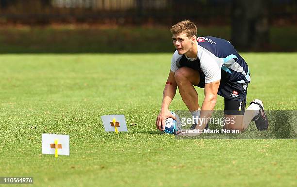 Berrick Barnes practices goal kicks during a Waratahs Super Rugby training session at Moore Park on March 22, 2011 in Sydney, Australia.