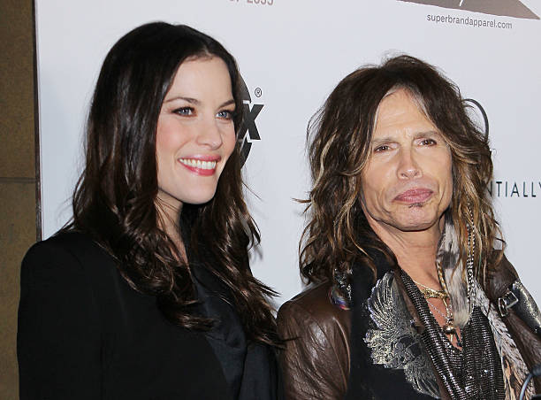 Liv Tyler and Steven Tyler arrive at the Los Angeles premiere of "Super" held at American Cinematheque's - Egyptian Theatre on March 21, 2011 in...