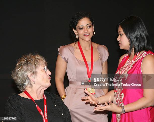 Feminist writer Germaine Greer speaks to a delegate while India Today Group Chief Creative Officer Kalli Purie looks on at lunch on Day 2 of the...