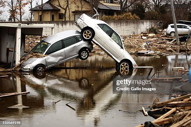 Two cars on top of each other on March 20, 2011 in Natori, Japan. The 9.0 magnitude strong earthquake struck offshore on March 11 at 2:46pm local...