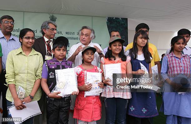 Minister of State for Environment and Forests Jairam Ramesh with winners of the painting competition organised on the occasion of World Forestry Day...