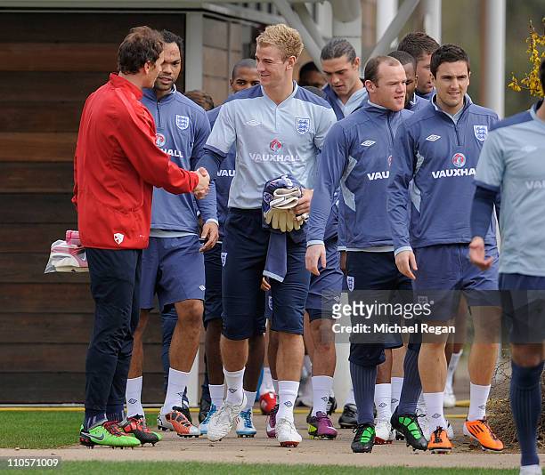 Jens Lehman of Arsenal greets Joe Hart of England during the England training session ahead of their UEFA EURO 2012 qualifier against Wales, at...