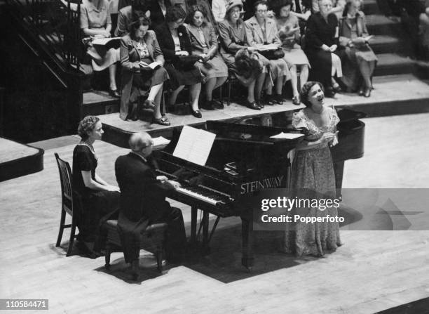 English contralto Kathleen Ferrier is accompanied by pianist and conductor Bruno Walter at the Usher Hall, during the Edinburgh Festival, 7th...