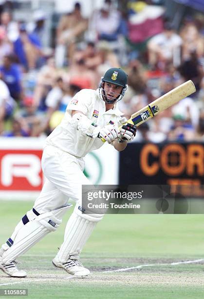 Graeme Smith plays a shot on his way to scoring 68 during the third day of the second test match between South Africa and Australia held at Newlands....