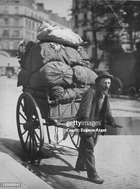 Ragpicker with his cart on the Avenue des Gobelins, Paris, 1899.