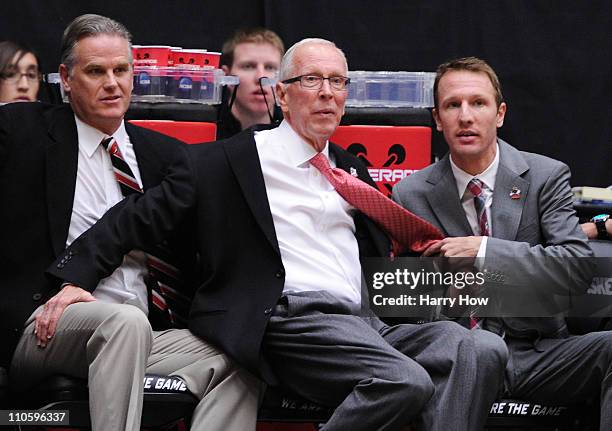 Head coach Steve Fisher of the San Diego State Aztecs stumbles during their game against the Temple Owls during the third round of the 2011 NCAA...