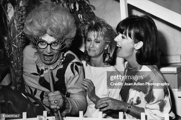 Dame Edna Everage known as the "Australian Housewife Superstar" and portrayed by Barry Humphries, makes a special appearance during an open house...