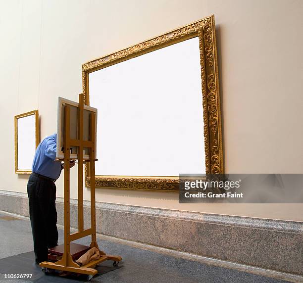 man copying blank frame. - blank canvas imagens e fotografias de stock