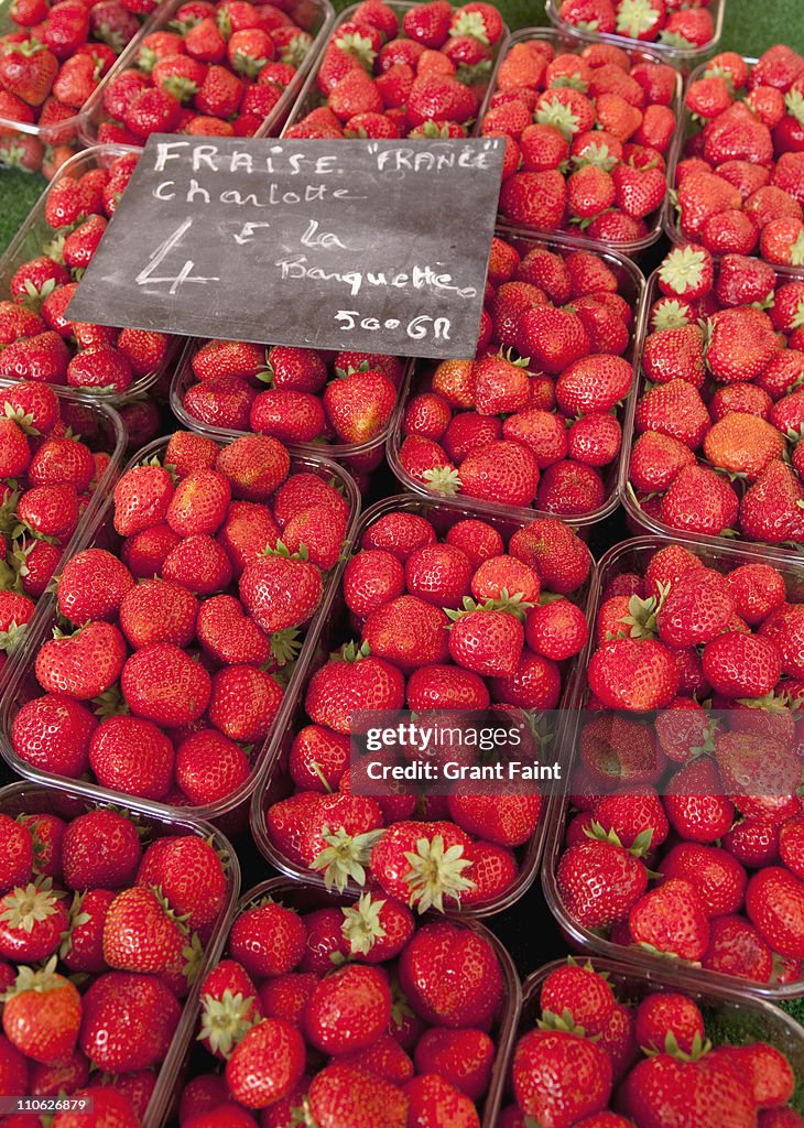Fresh strawberries for sale in market.