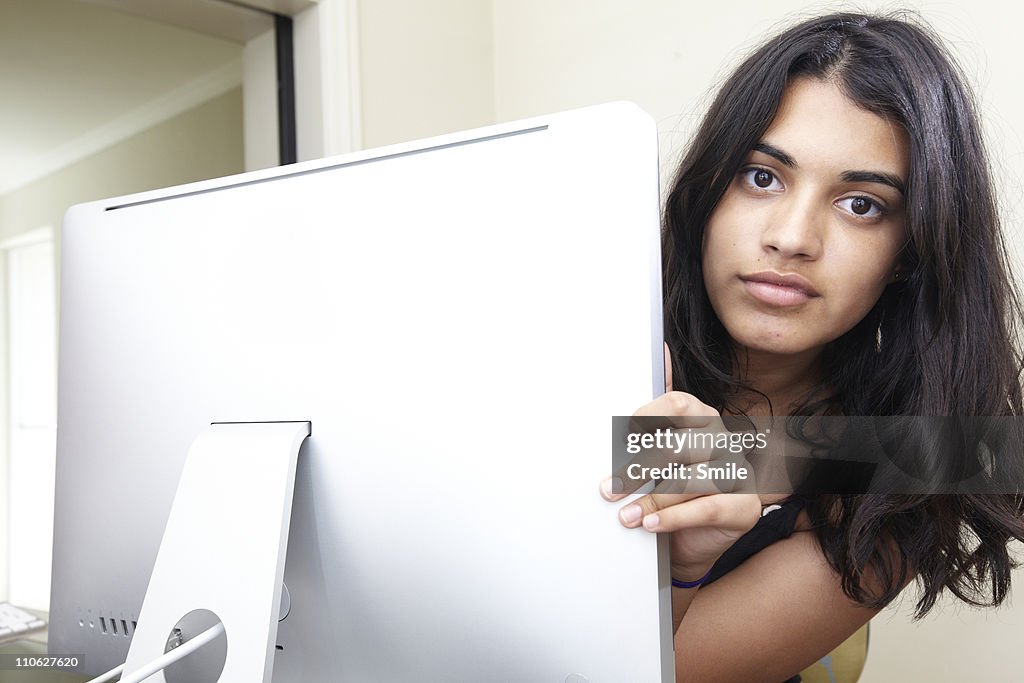 Girl Behind A Computer Portrait Of Teen Girl Behind Computer Screen High-Res Stock Photo ...