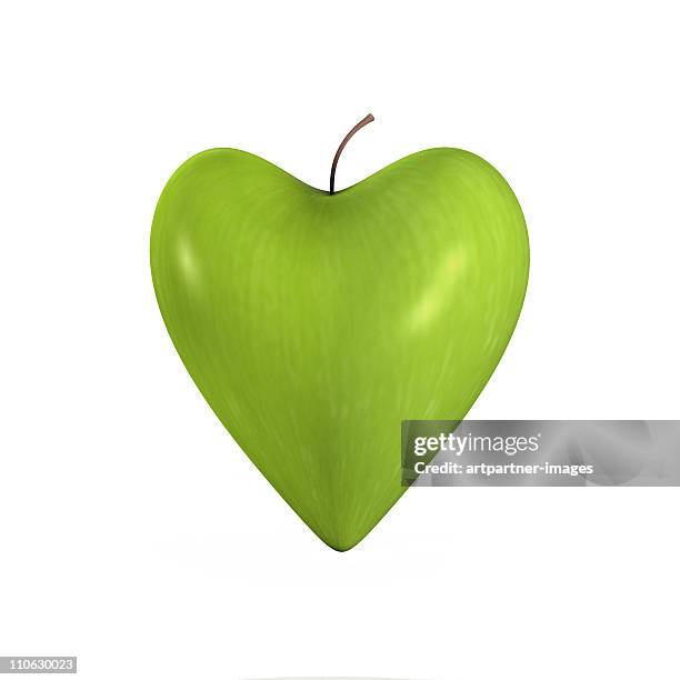 a heart-shaped fresh green apple - apple heart stock pictures, royalty-free photos & images