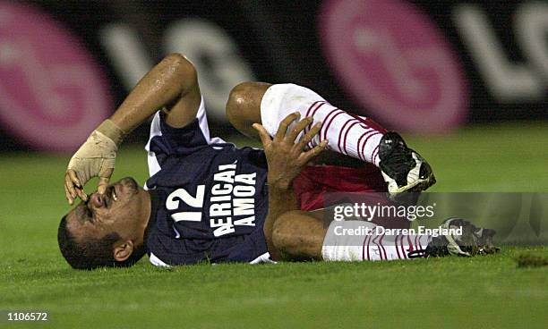Alex Savea of American Samoa reacts after being tackled during the Oceania group one World Cup qualifier match between Samoa and American Samoa...