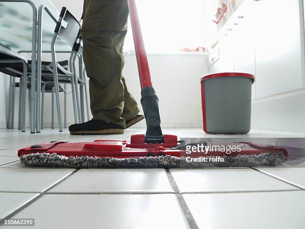 cleaning kitchen - kitchen mop stock pictures, royalty-free photos & images