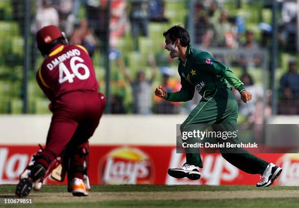 Mohammad Hafeez of Pakistan celebrates after taking the wicket of Darren Bravo of West Indies during the 1st quarterfinal of the ICC Cricket World...