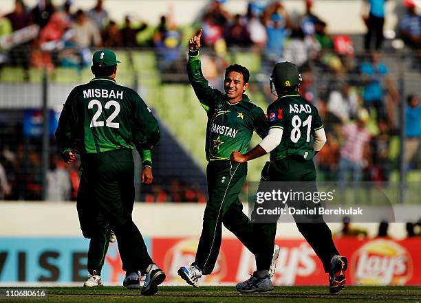 Mohammad Hafeez of Pakistan celebrates after taking the wicket of Davendra Bishoo of West Indies during the 1st quarterfinal of the ICC Cricket World...