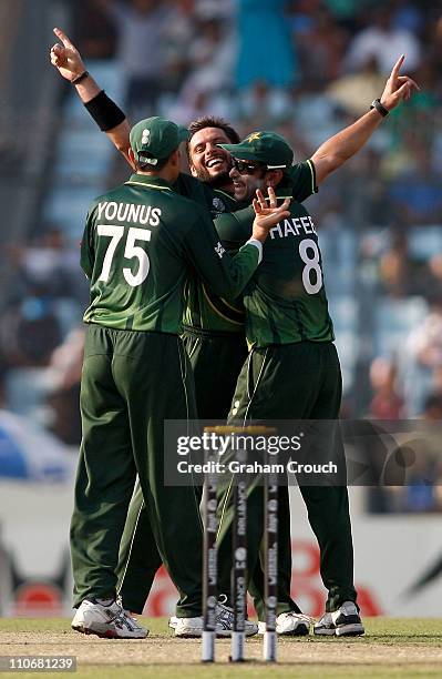 Shahid Afridi of Pakistan celebrates the wicket of Kieron Pollard of West Indies during the first ICC 2011 World Cup quarter final at Shere-e-Bangla...