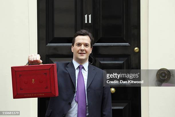 Chancellor of the Exchequer George Osborne poses for photographs outside 11 Downing Street on March 23, 2011 in London, England. The Chancellor is...