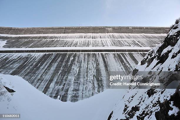 Snow covers the Grande Dixence Dam on March 22, 2011 in Heremence, Switzerland. Opened in 1965 after 15 years of construction, measuring 285 metres...