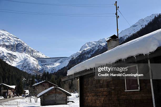 Snow covers the roofs of chalets in the downstream village of the Grande Dixence Dam on March 22, 2011 in Heremence, Switzerland. Opened in 1965...