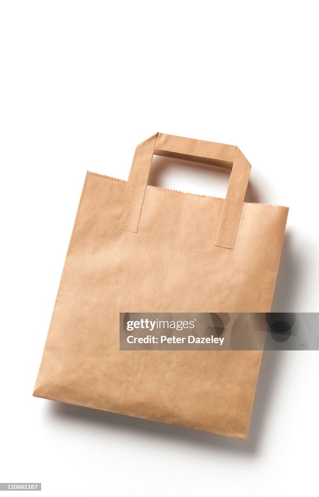Disposable brown paper bag with cope space