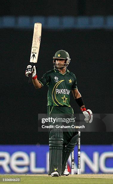 Mohammad Hafeez of Pakistan acknowledges his half century while batting against West Indies during the first ICC 2011 World Cup quarter final at...