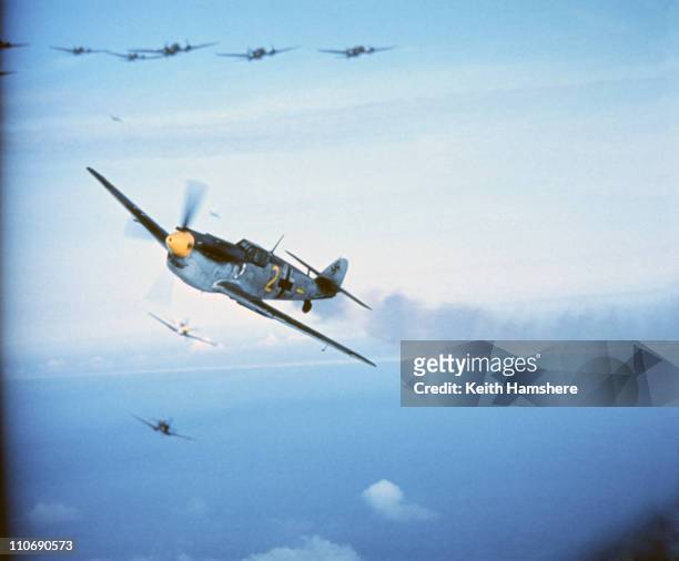 An optically merged image of a dogfight over England between a Spitfire and a Messerschmitt ME 109, made after aerial shots were filmed for 'Battle...