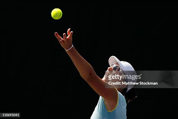 Yaroslava Shvedova of Kazakhstan serves against Sara Errani of Italy during the Sony Ericsson Open at Crandon Park Tennis Center on March 23, 2011 in...