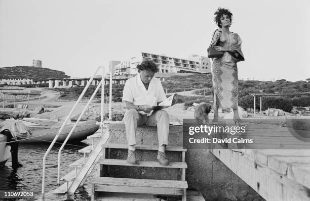 Actor Richard Burton with his wife, actress Elizabeth Taylor on Capo Caccia in Sardinia, during the filming of 'Goforth', later titled 'Boom'.