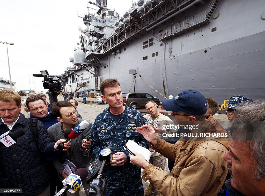Captain Steven J. Yoder , Commodore, Amphibious Squadron SIX, speaks ...