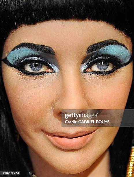 The wax figure of Elizabeth Taylor in one of her most famous roles, Cleopatra, is pictured at Madame Tussauds in Hollywood, California, on March...