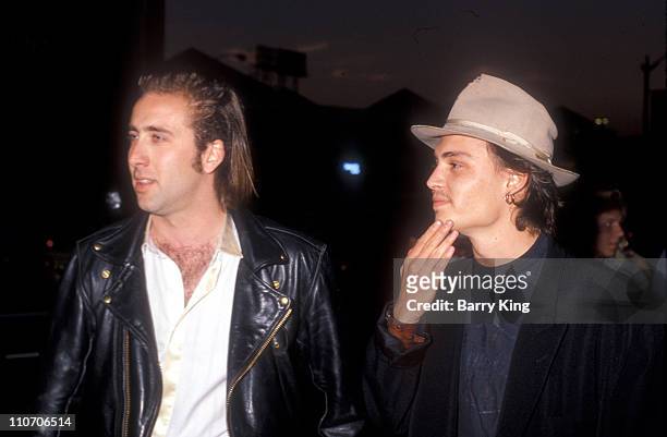 Nicolas Cage & Johnny Depp during Decline of Western Civilization Part 2:: The Metal Years Premiere at Cinerama Dome in Los Angeles, California,...