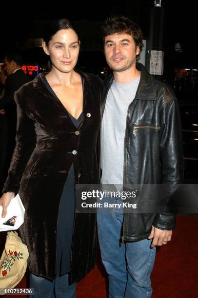 Carrie-Anne Moss and Steven Roy during "The Cooler" Los Angeles Premiere - Arrivals at The Egyptian Theater in Hollywood, California, United States.