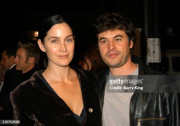 Carrie-Anne Moss and Steven Roy during "The Cooler" Los Angeles Premiere - Arrivals at The Egyptian Theater in Hollywood, California, United States.