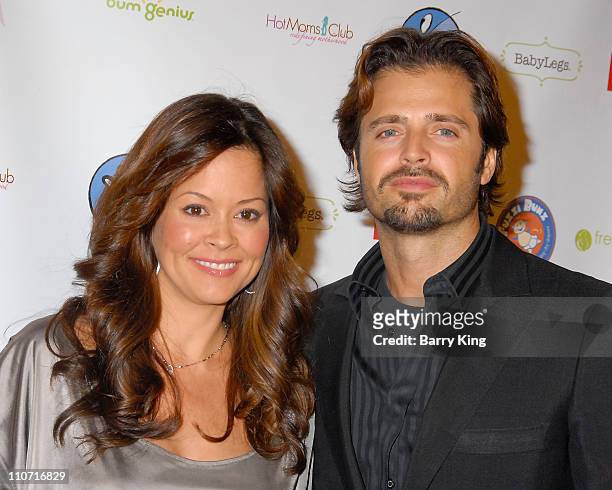 Actress Brooke Burke and actor David Charvet attend the Los Angeles premiere of "The Business of Being Born" held at the Fine Arts Theatre on January...