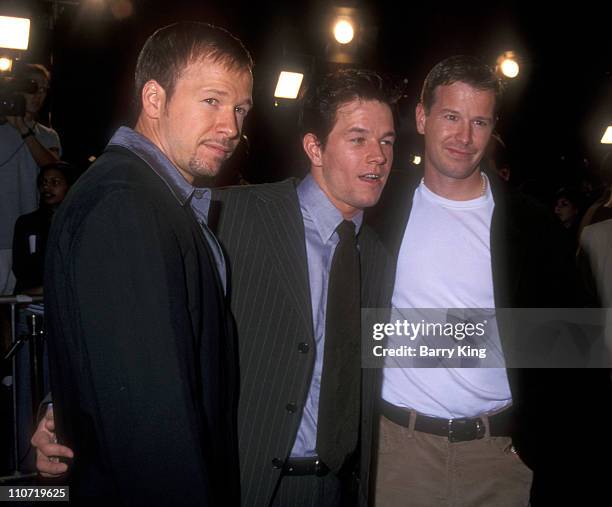 Donnie Wahlberg and Mark Wahlberg and guest during "Boogie Nights" Los Angeles Premiere at Mann Chinese Theatre in Hollywood, California, United...