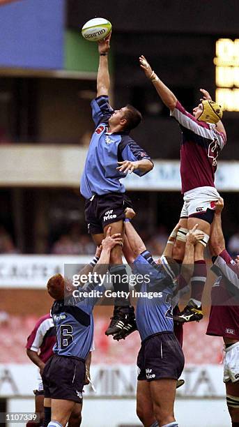 Piet Joubert of the Bulls wins the line-out against Mark Conners of the Reds during Super 12 match between the Bulls and Reds at Loftus Stadium,...