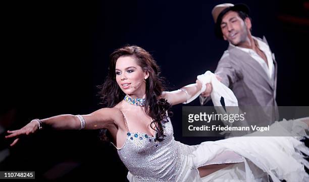 Liliana Matthaeus and Massimo Sinato perform during the 'Let's Dance' TV show at Coloneum on March 23, 2011 in Cologne, Germany.