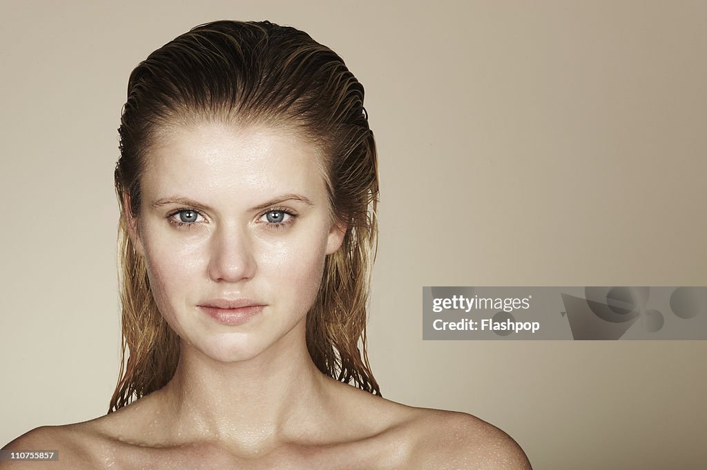 Woman with wet hair and skin