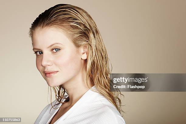 portrait of woman with wet hair - wet hair stock pictures, royalty-free photos & images