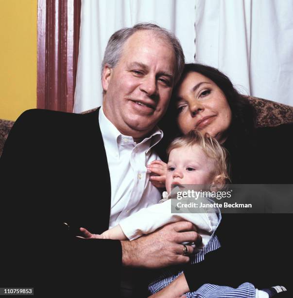 Maria Burton, the adopted daughter of Elizabeth Taylor and Richard Burton, at home with her husband and child in New Jersey, 2003.