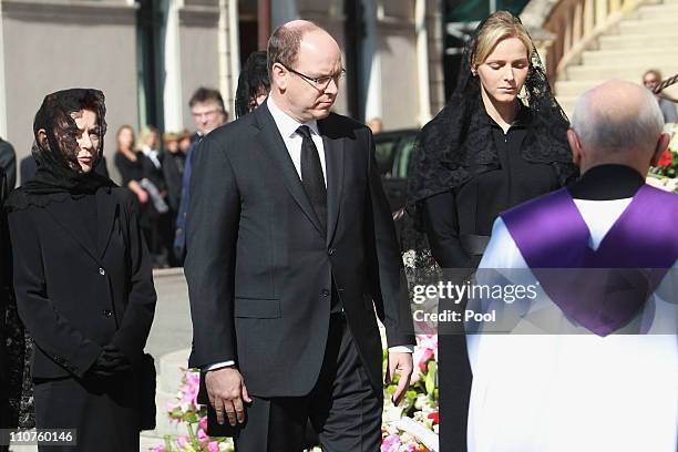 Elisabeth-Anne de Massy, Prince Albert II of Monaco and Charlene Wittstock attend the funeral of Princess Melanie-Antoinette at Cathedrale...