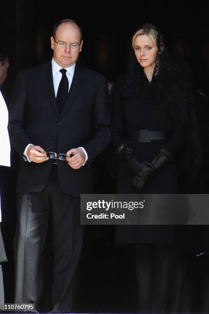 Prince Albert II of Monaco and Charlene Wittstock attend the funeral of Princess Melanie-Antoinette at Cathedrale Notre-Dame-Immaculee de Monaco on...