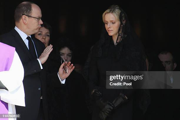 Prince Albert II of Monaco, Princess Caroline of Hanover and Charlene Wittstock attend the funeral of Princess Melanie-Antoinette at Cathedrale...