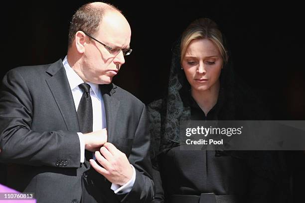 Prince Albert II of Monaco and Charlene Wittstock attend the funeral of Princess Melanie-Antoinette at Cathedrale Notre-Dame-Immaculee de Monaco on...